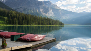 Dock canoes mountain lake clouds - lake free wallpaper
