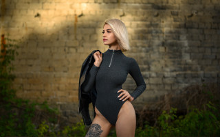 Woman bodysuit brick wall artdeco - a jacket free wallpaper