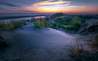 Sunset beach grass dunes hill - a hill in the distance free wallpaper for desktop