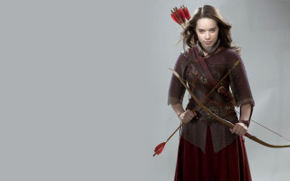 Woman costume bow arrow red - a woman in a costume holding free wallpaper