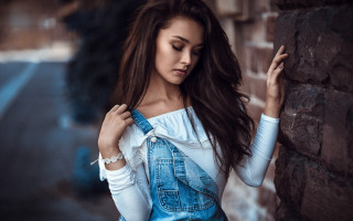 Elina karimova brick wall fashion - a woman leaning against a brick wall free wallpaper