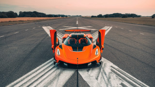 Orange sports car runway futurism - the door open free wallpaper
