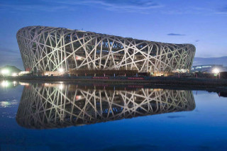 Large building tall structure water - side next free wallpaper