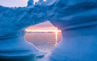 Large iceberg hole sunset ecological - a large iceberg free wallpaper