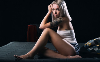 Woman sitting tattoo barefoot arabesque - her arm and leg free wallpaper