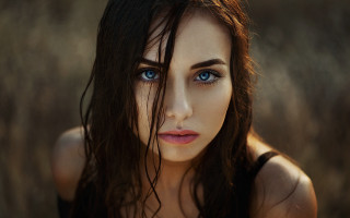 Woman blueeyes longhair field gothic - a picture in a field of grass free wallpaper