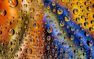 Water droplets rainbow background macro - a window pane free wallpaper