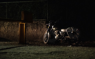 Motorcycle fence night cross road - a cross free wallpaper