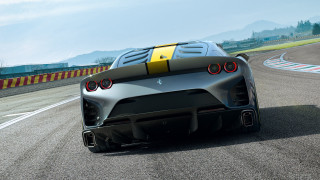 Black yellow sportscar racetrack mountains - sports car free wallpaper