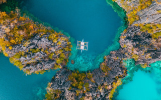 Lake mountains boat dock autumn - aerial free wallpaper