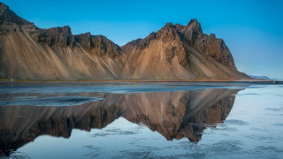 Mountain lake landscape blue sky - a lake in front free wallpaper