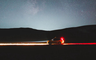 Night sky stars car road - amir zand free wallpaper