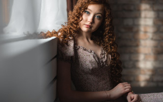 Redhead woman leaning window brickwall - a brick wall behind her free wallpaper for desktop