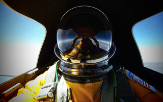 Space suit person ocean window - wide angle len free wallpaper