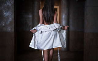 Woman white dress hallway space - a white coat free wallpaper