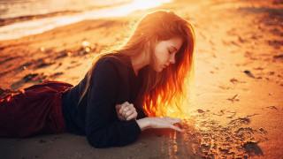 Beach woman sunset fire autumn - the sun shining behind her free wallpaper