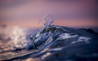 Wave breaking ocean pink sky - a pink sky in the background free wallpaper for desktop