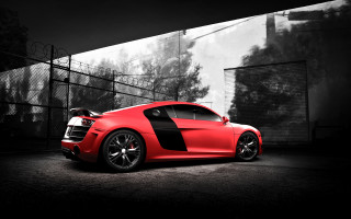 Red sports car fenced road - andrew law free wallpaper