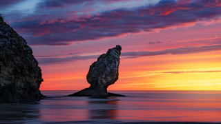 Mystical rock formation sunset water - a rock formation free wallpaper