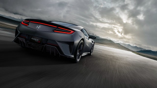 Grey sports car cloudy mountains - a dark cloud free wallpaper