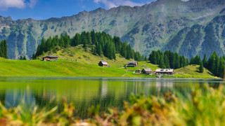 Lake mountains forest houses bicycle - a few house free wallpaper