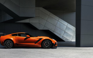 Orange sports car building staircase - a orange sports car free wallpaper