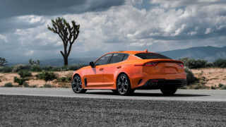Orange sports car desert road - orange sports car free wallpaper
