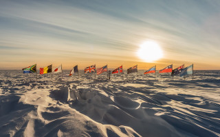 Flags snow ocean sunset beach - david g. sorensen free wallpaper