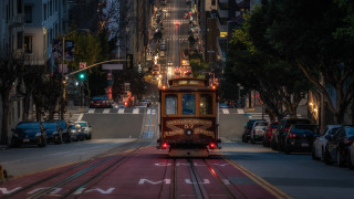 Trolley night cityscape bridge lights - a trolley car free wallpaper