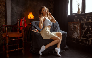 Woman sitting couch lamp chair - a couch in a room free wallpaper