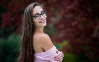 Eszter mattioni glasses smiling outdoors - free portrait wallpaper for desktop