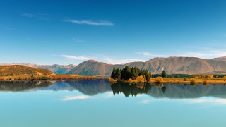 Lake mountains trees blue sky 45 - a clear blue sky above free wallpaper