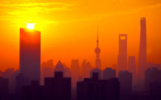 City skyline orange sky sunset - a few building free wallpaper