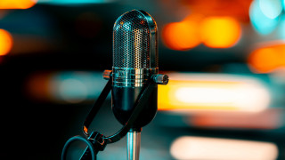 Microphone portrait blurry background night - a cord free wallpaper