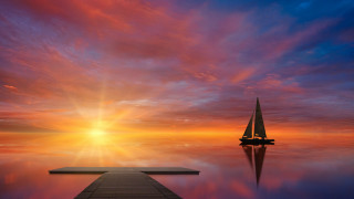 Sailboat dock sunset mountain cityscape - a sailboat free wallpaper