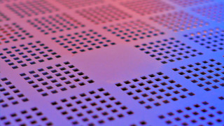 Metal holes red dot tiltshift - a close up of a piece free wallpaper