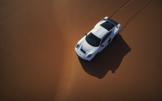 White car driving desert sand - sand free wallpaper