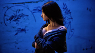 Woman black dress blue wall 2 - a blue wall free wallpaper for desktop