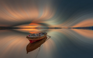 Boat lake sunset mystical colors - top of a lake under a cloudy sky free wallpaper