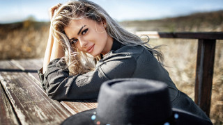 Woman longhair cowboyhat portrait outdoors - her head and a hat free wallpaper