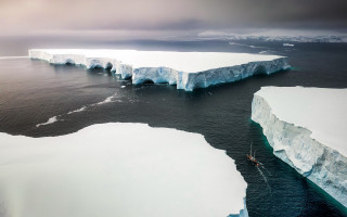 Boat icebergs ocean mountain sky - cliff childs free wallpaper
