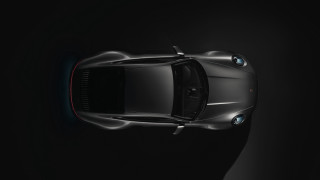 Black sports car top down - a spotlight free wallpaper