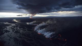 Volcano smoke steam ocean night - apocalyptic free wallpaper