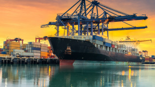 Large ship dock sunset crane - a crane in the background free wallpaper