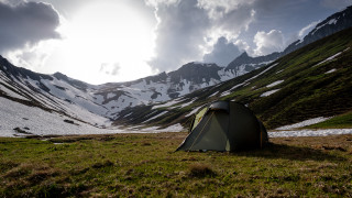 Tent field mountains clouds tilt - a tent free wallpaper