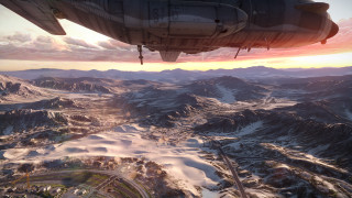 Mountain range plane window sunset 2 - a view of a mountain range free wallpaper