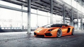 Orange sports car building windows - nice free wallpaper