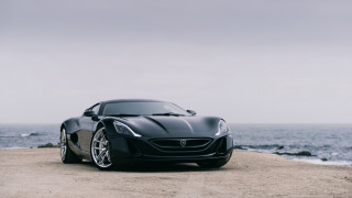 Black sports car beach ocean - regal free wallpaper