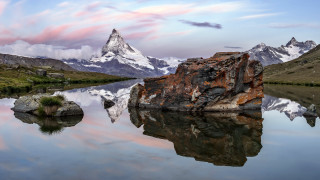 Mountain lake rock sky ocean - a pink sky free wallpaper for desktop