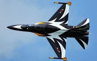 Jet blue sky yellow black - a yellow tail free wallpaper